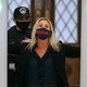 Rep. Marjorie Taylor Greene is searched by Capitol Police after setting off the metal detector outside the doors to the House of Representatives on Jan. 12, 2021.